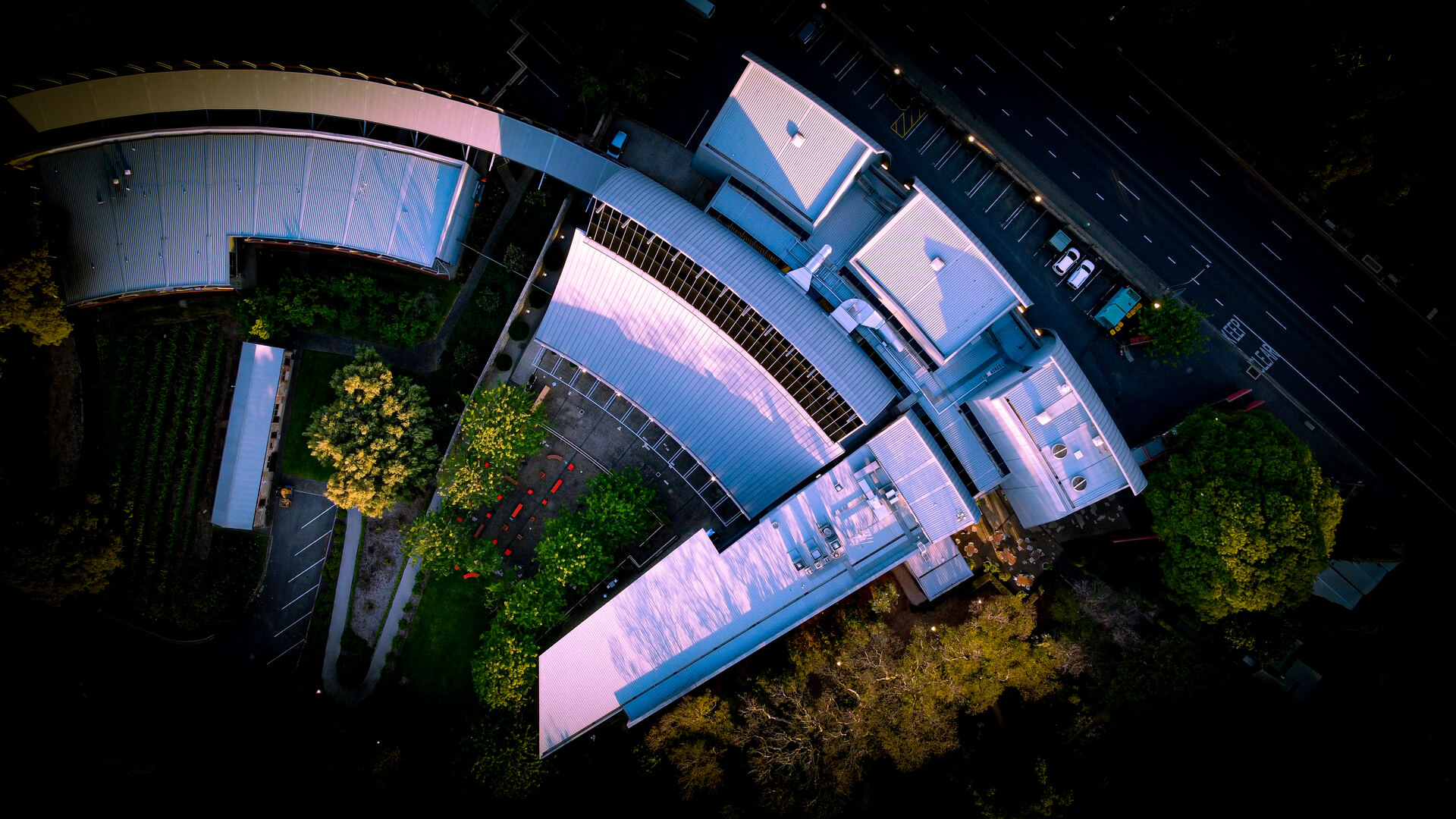 Top-down drone view of modern commercial building architecture